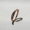 Dual Flow Shimmer Ring (Rose Gold) | 玫瑰金雙生流光戒指的傾斜左側立體光影特寫 - Ostialia 奧斯提亞